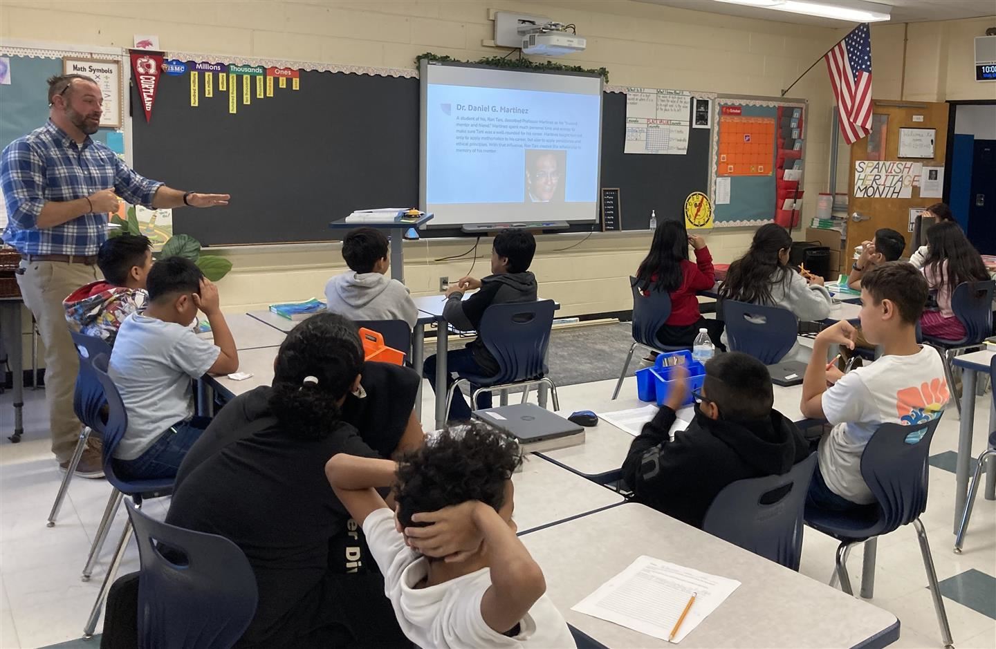  A teacher instructs the classroom