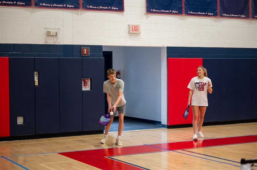High School students playing pickleball during the recent Spring Enrichment day.
