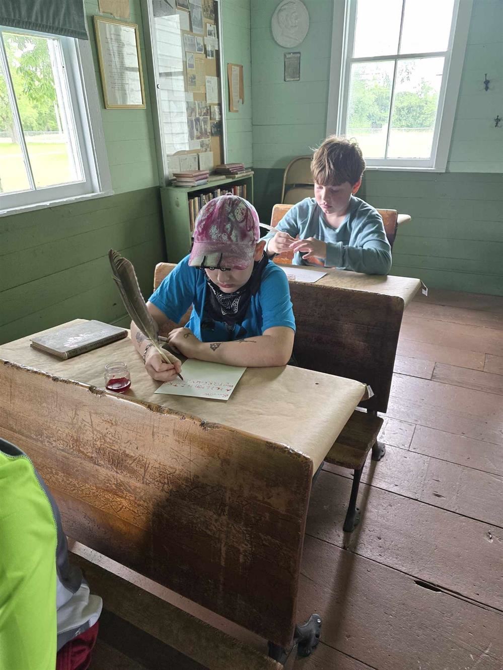  Students from Lura Sharp Elementary learning all about 1800s farm life.