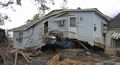 House atop truck, Lower 9th Ward