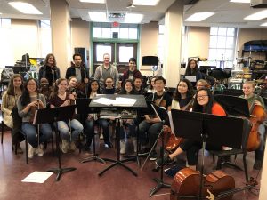 Students with music instruments