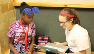 2 girls viewing computer