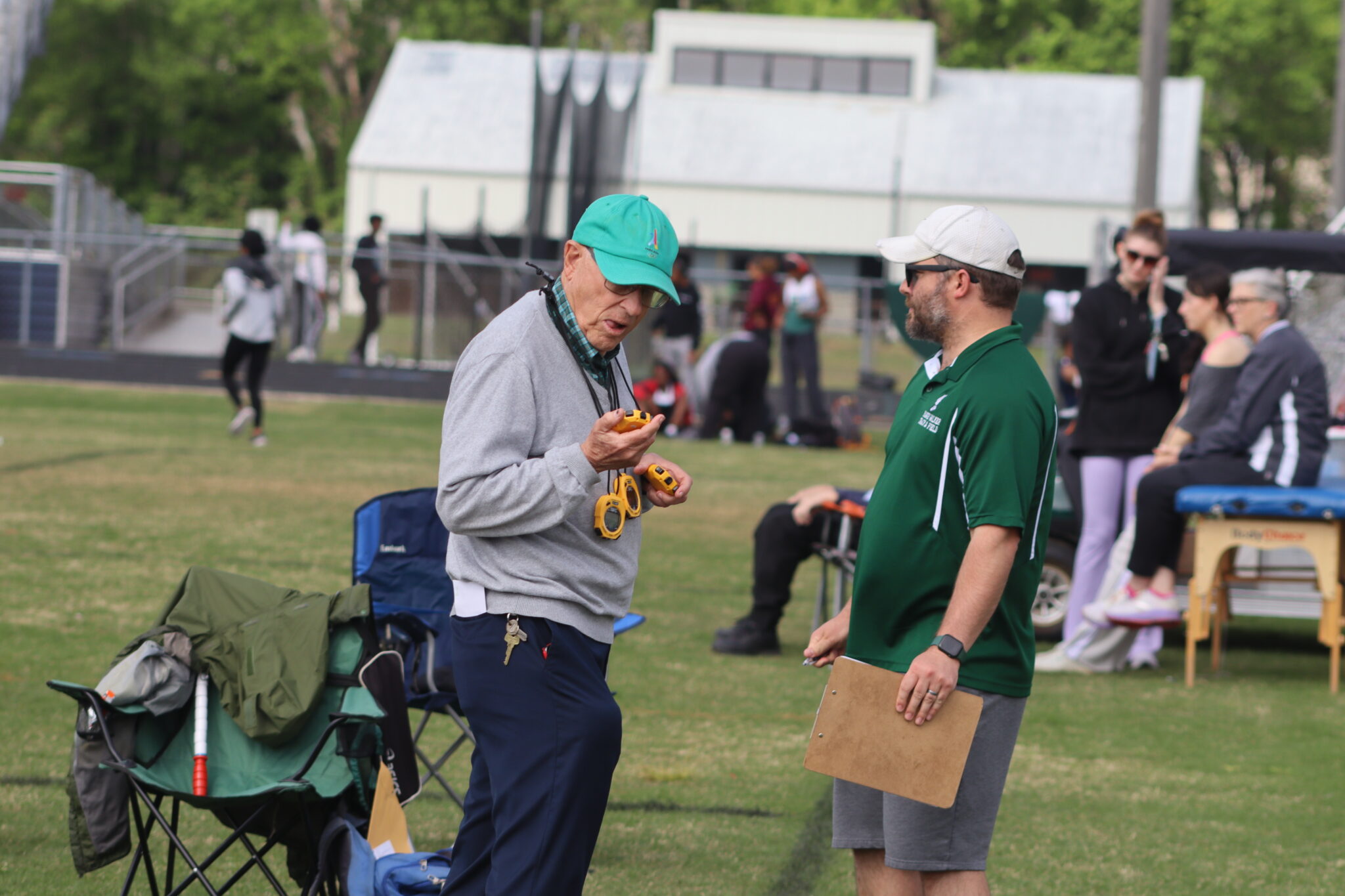 Track Coach Holdren and Coach Webb