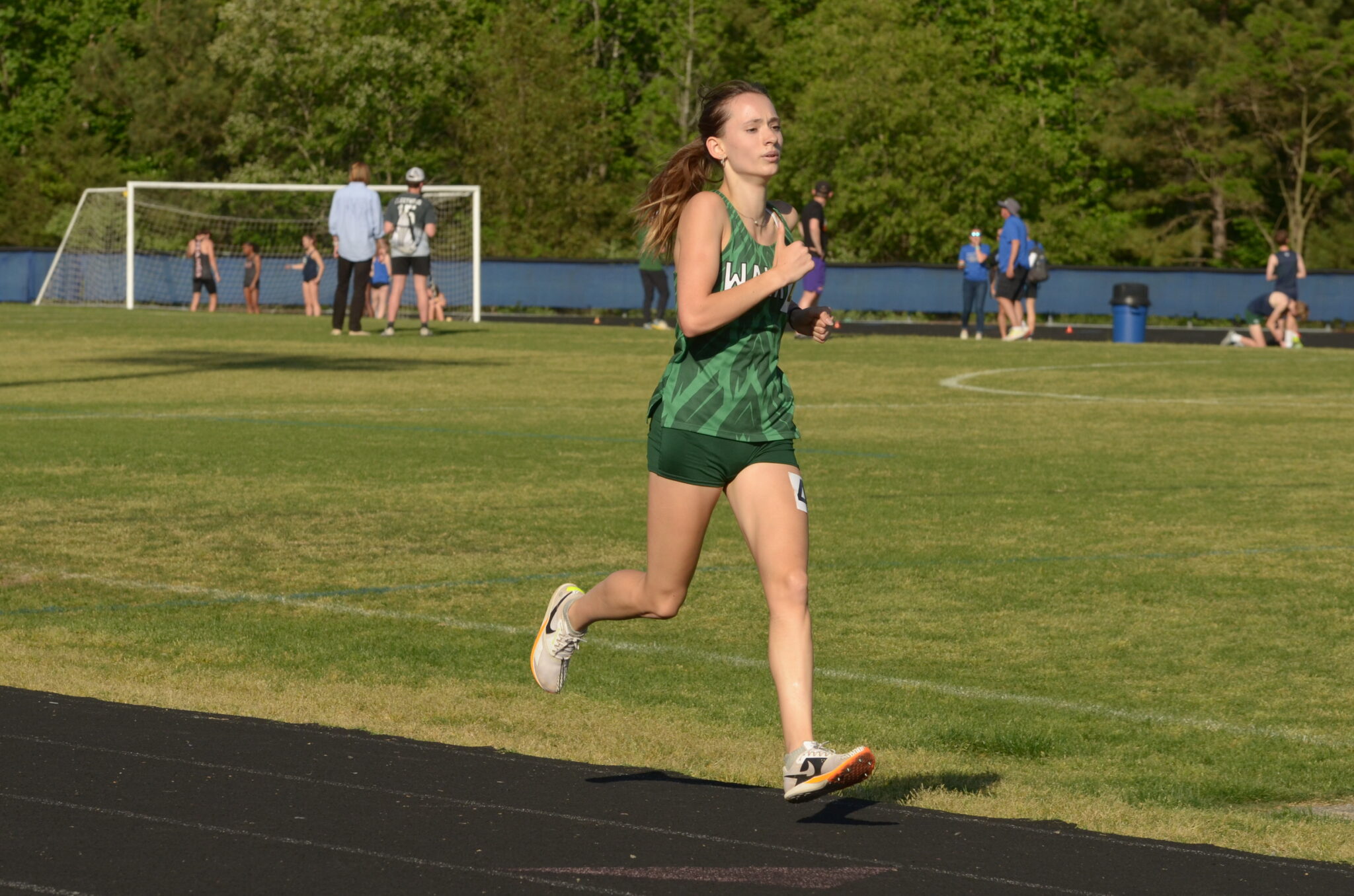 Girls running on track
