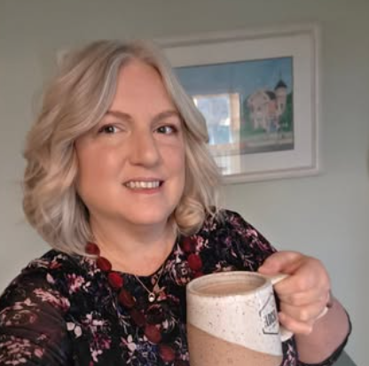 Teacher drinks coffee
