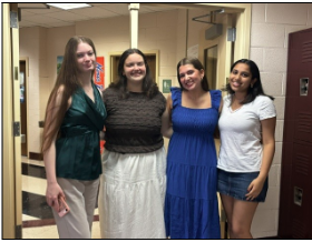 4 females standing together