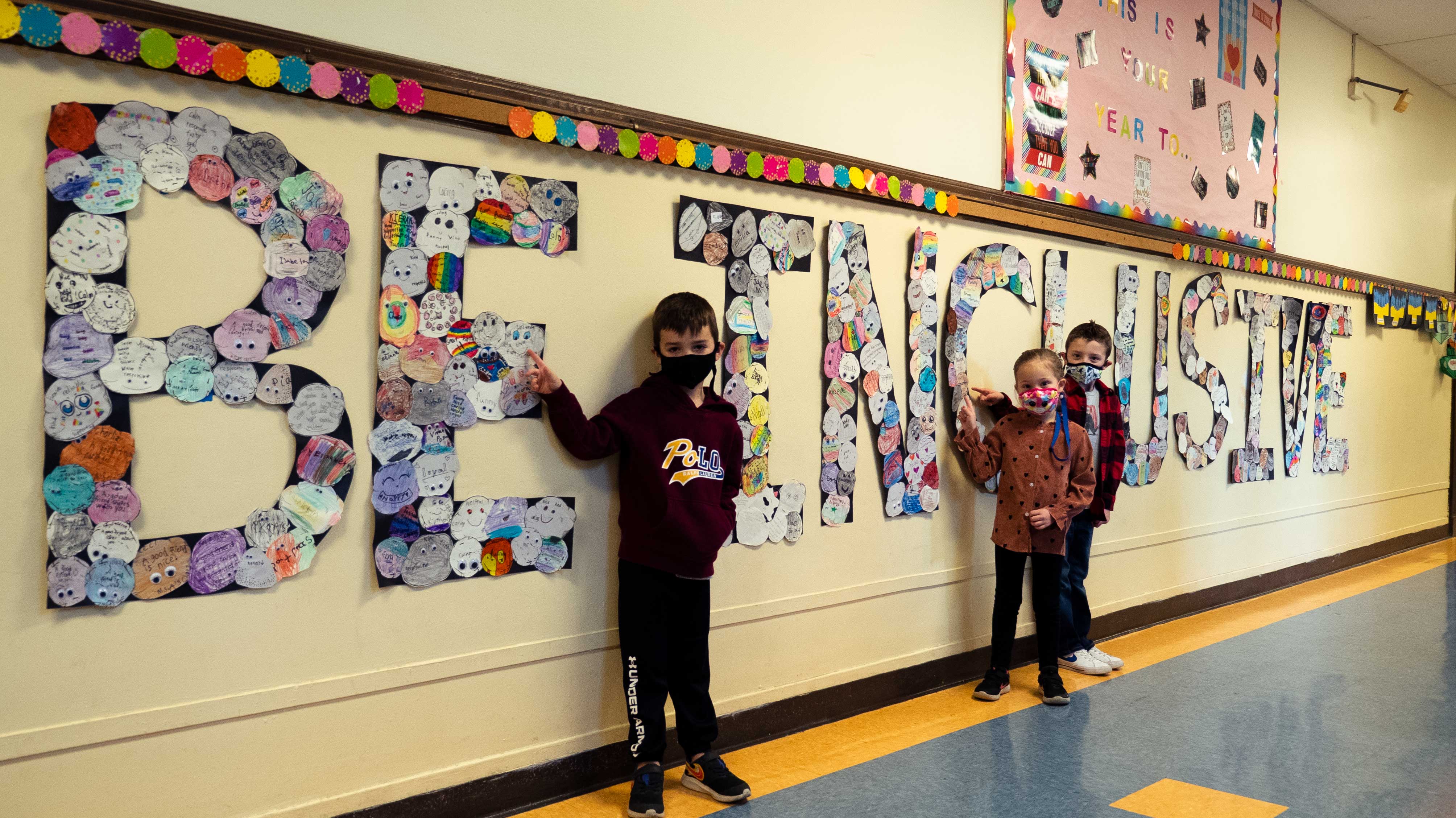 Hewitt Students added rocks to the Be Inclusive mural after reading "Ricky, the Rock That Couldn't Roll"