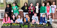 JAE 3rd graders planting flower boxes. thumbnail258584