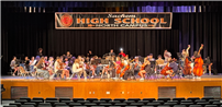 Student musicians from Sachem North High School’s Symphony Orchestra, under the direction of Dorie Downs, and Symphonic Band, led by Dave Jaklitsch. thumbnail266919
