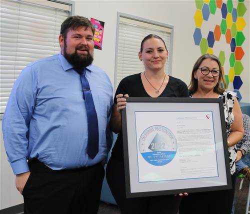  Photo of Rob Erickson, Star Graves, Ana Garcia receiving award