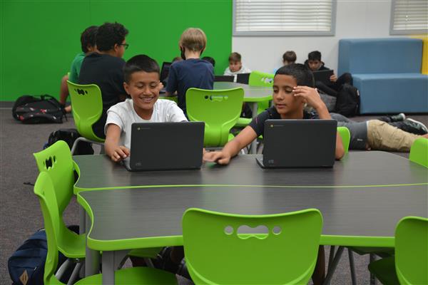 Students finishing work on chromebooks