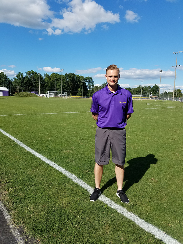 This is the image for the news article titled SHS soccer coach shares passion for sport, life with team