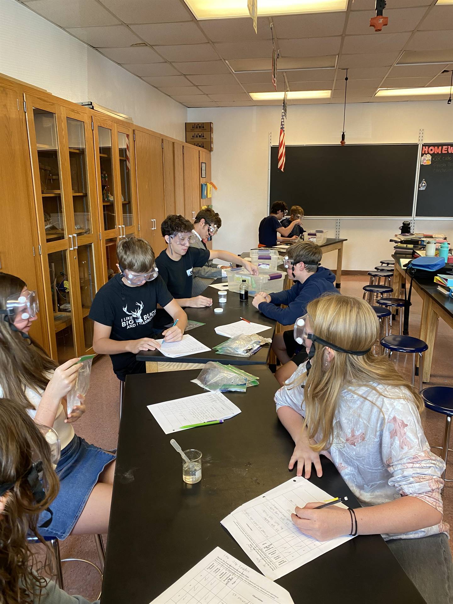 Middle School students work on a science experiment