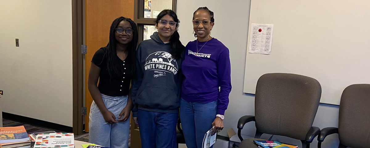 Dr. Hightower and students sorting books during the McCracken MLK Jr. Day of Service