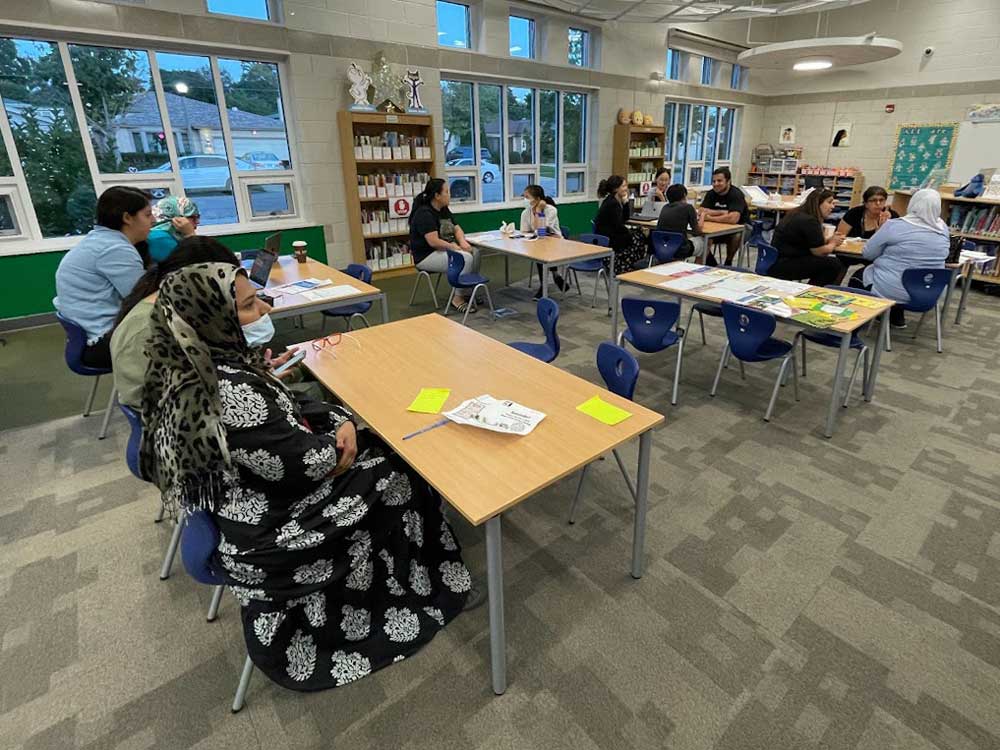 Photo of BPAC members gathered for a meeting in the Meyer School library