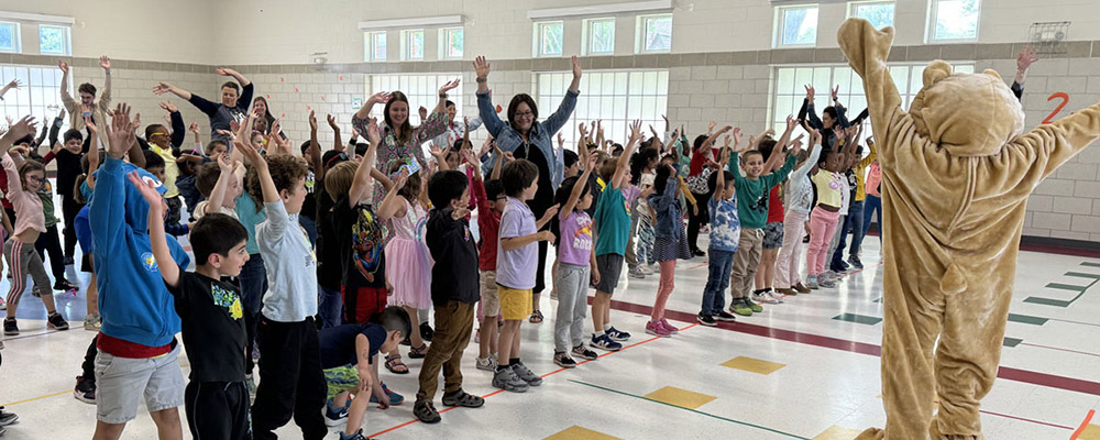Photo of Meyer dance party with Mr. Mac