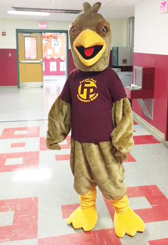 two boys visit the new Falcon mascot