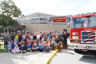 students with fire truck