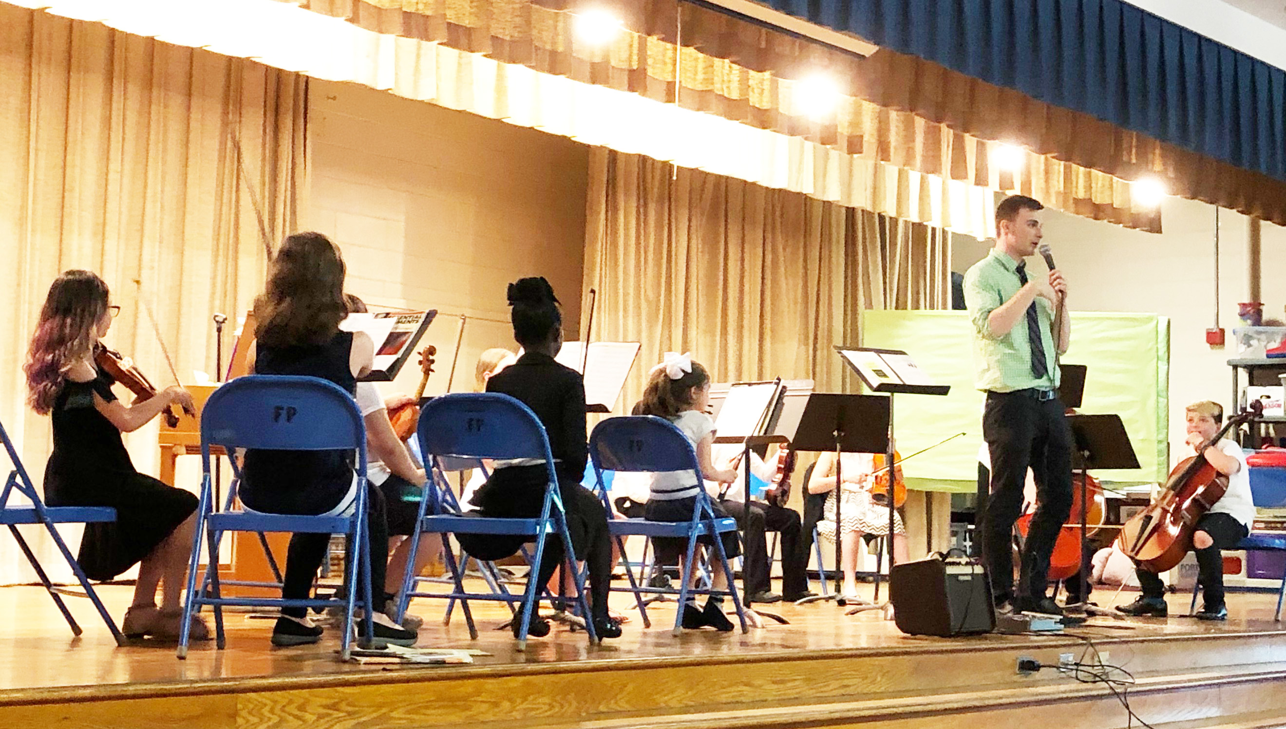 4th grade musicians perform on stage