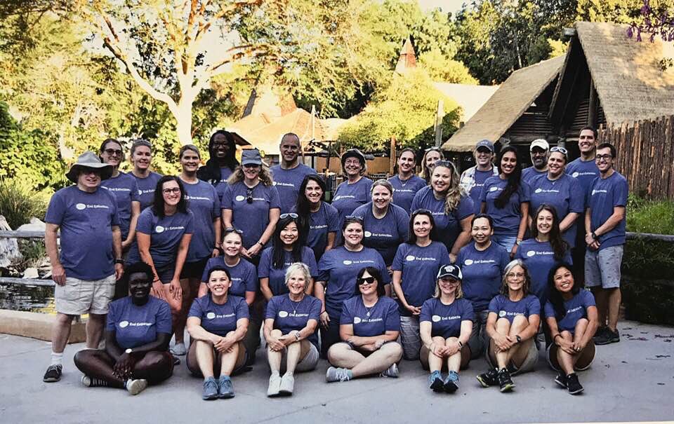 group of teachers in blue shirts