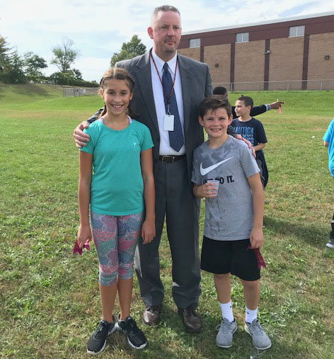 2 runner with their principal