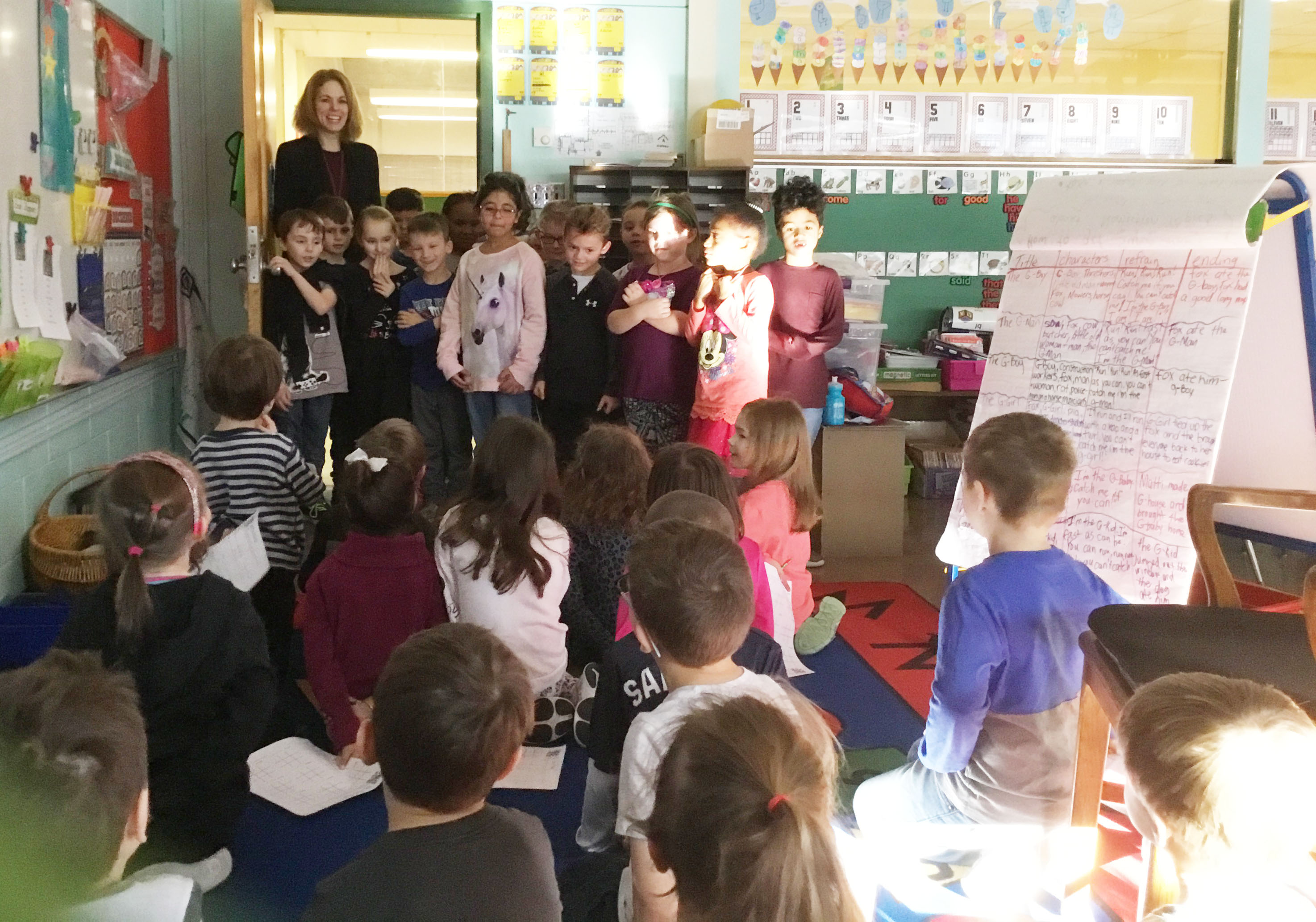 kindergartners sing to a group of students