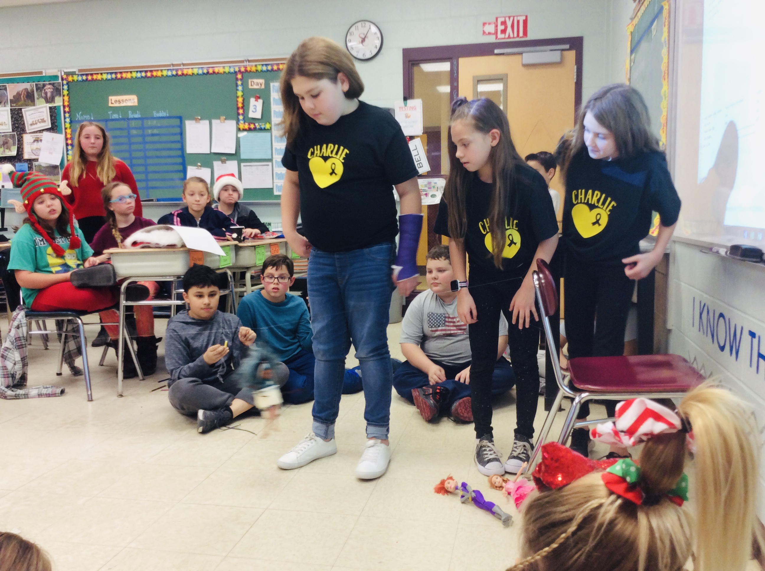 students work on science project in a classroom