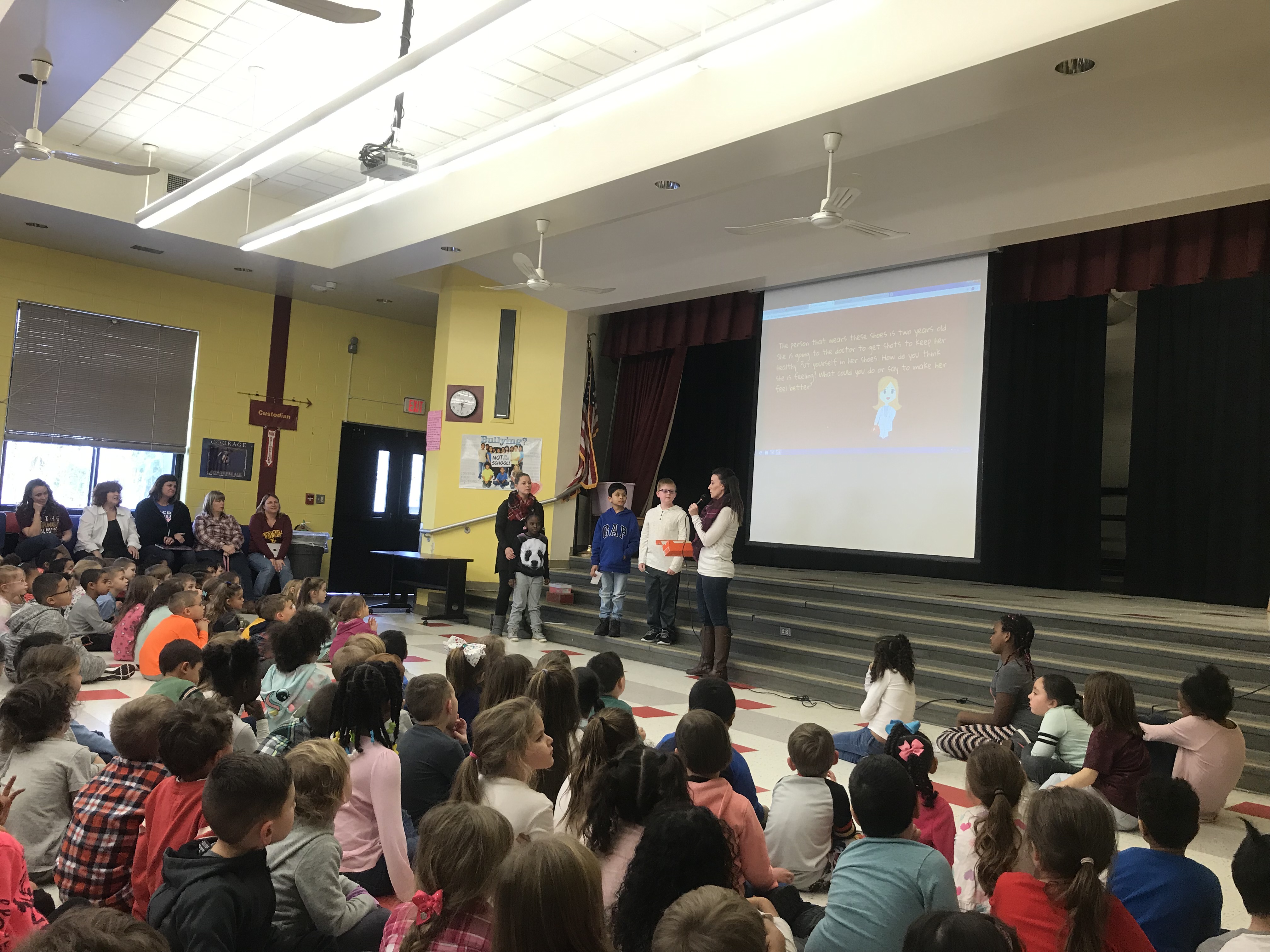 large group of students at an assembly