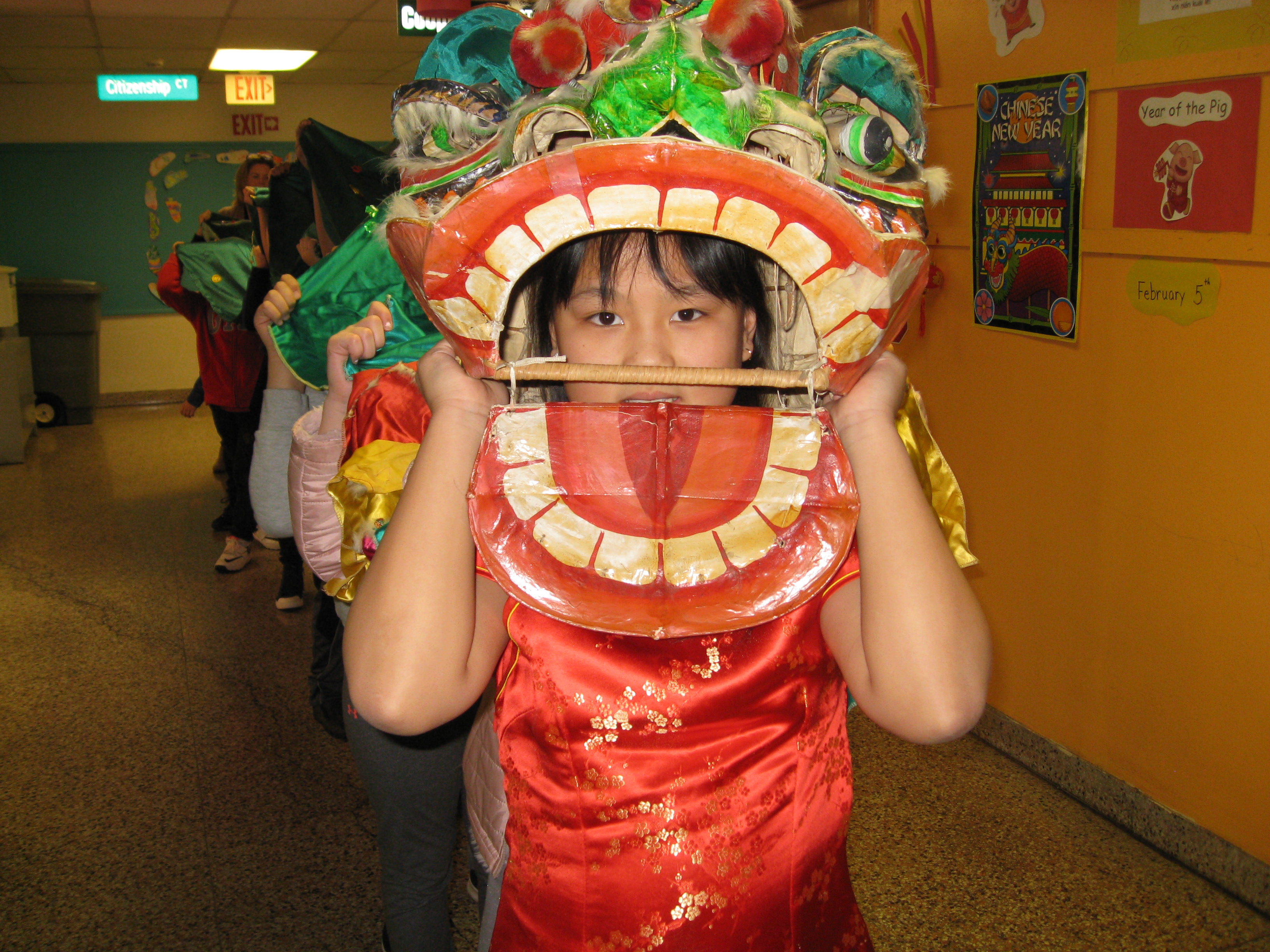 girl wearing a dragon helmet