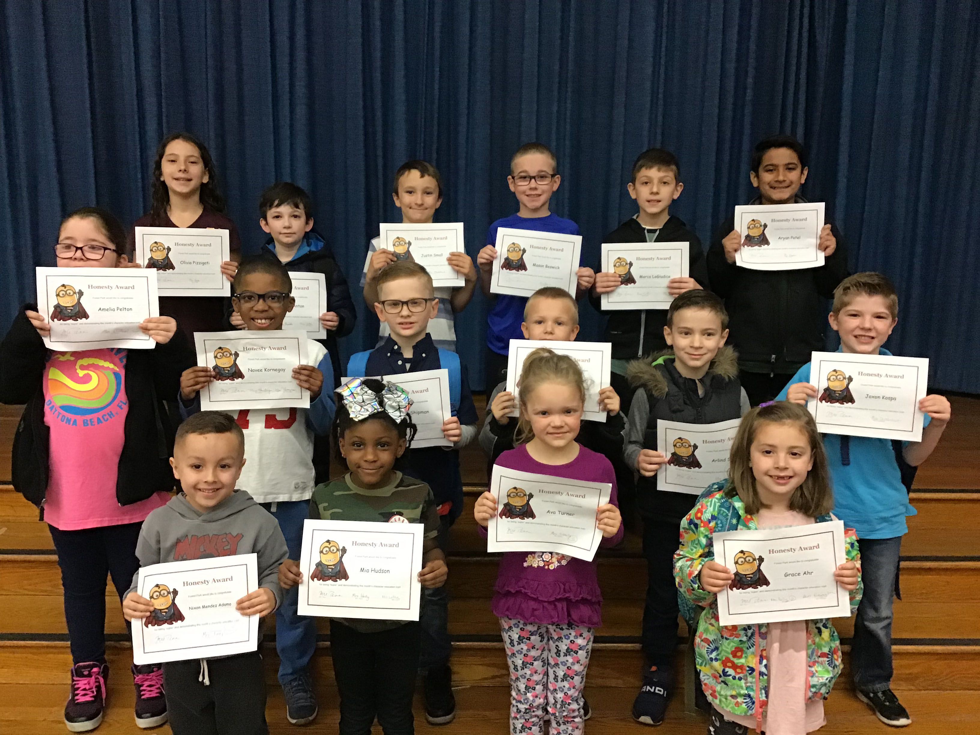 group of students with their award certificates