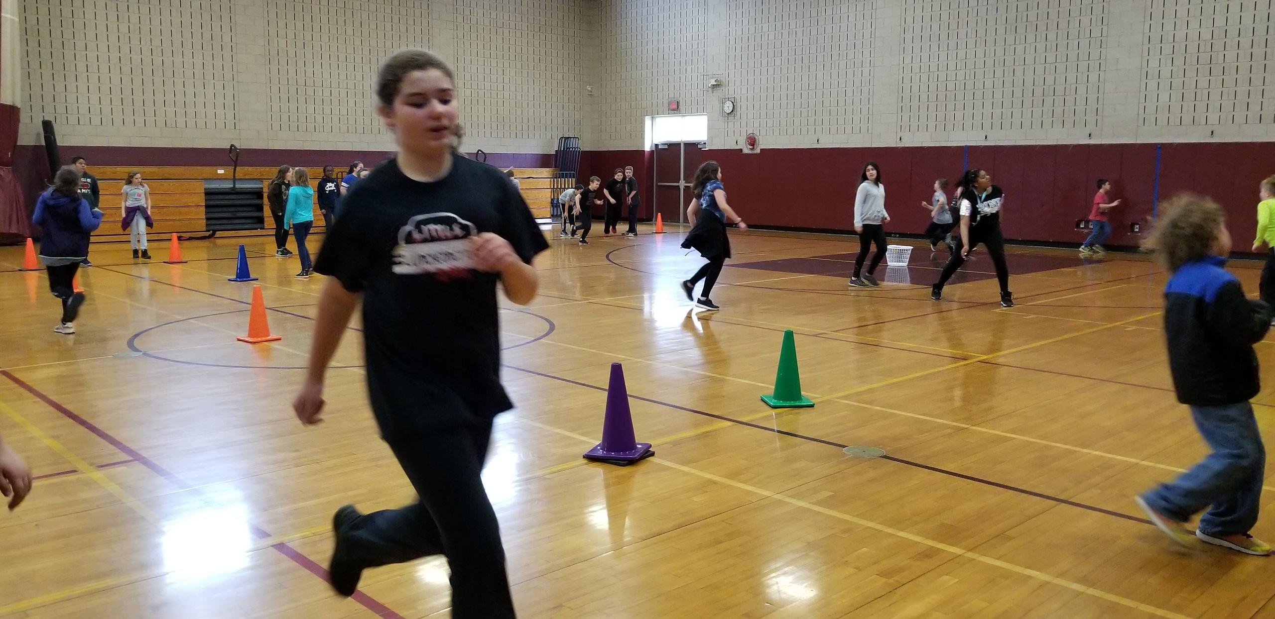 girl runs in the gym