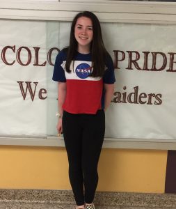 girl stand up against a wall