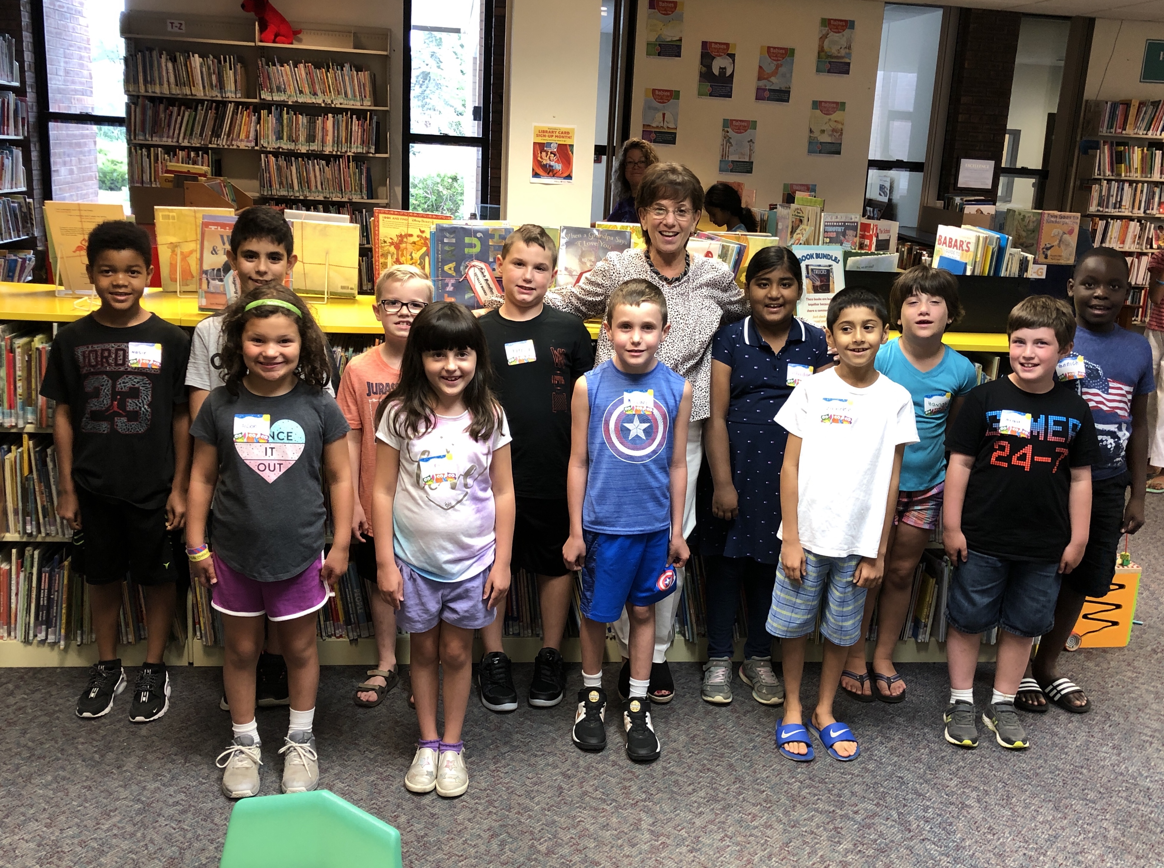 group photo of third graders at library