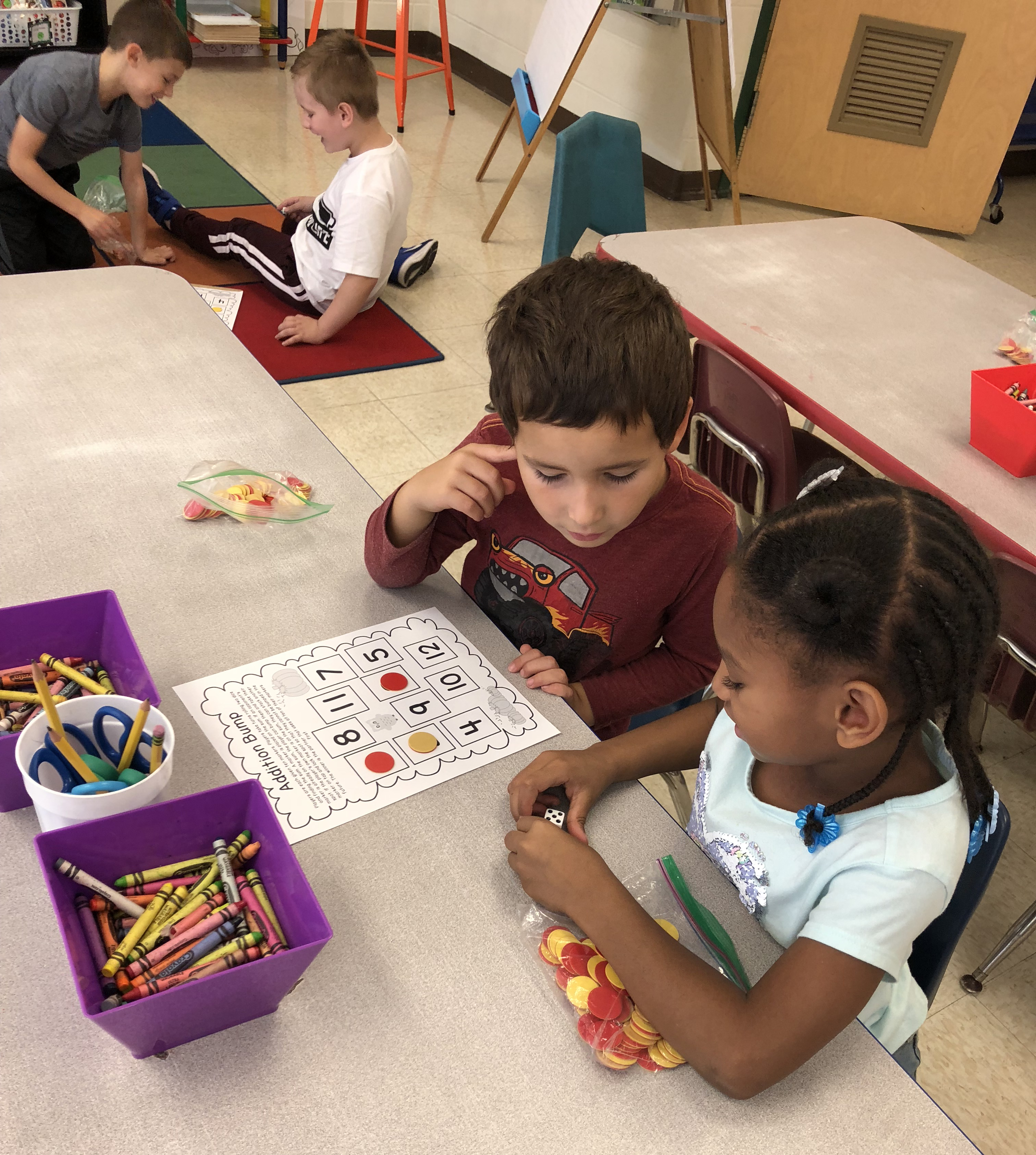 children work on math together