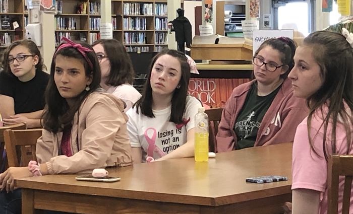 group of high school girls at a desk