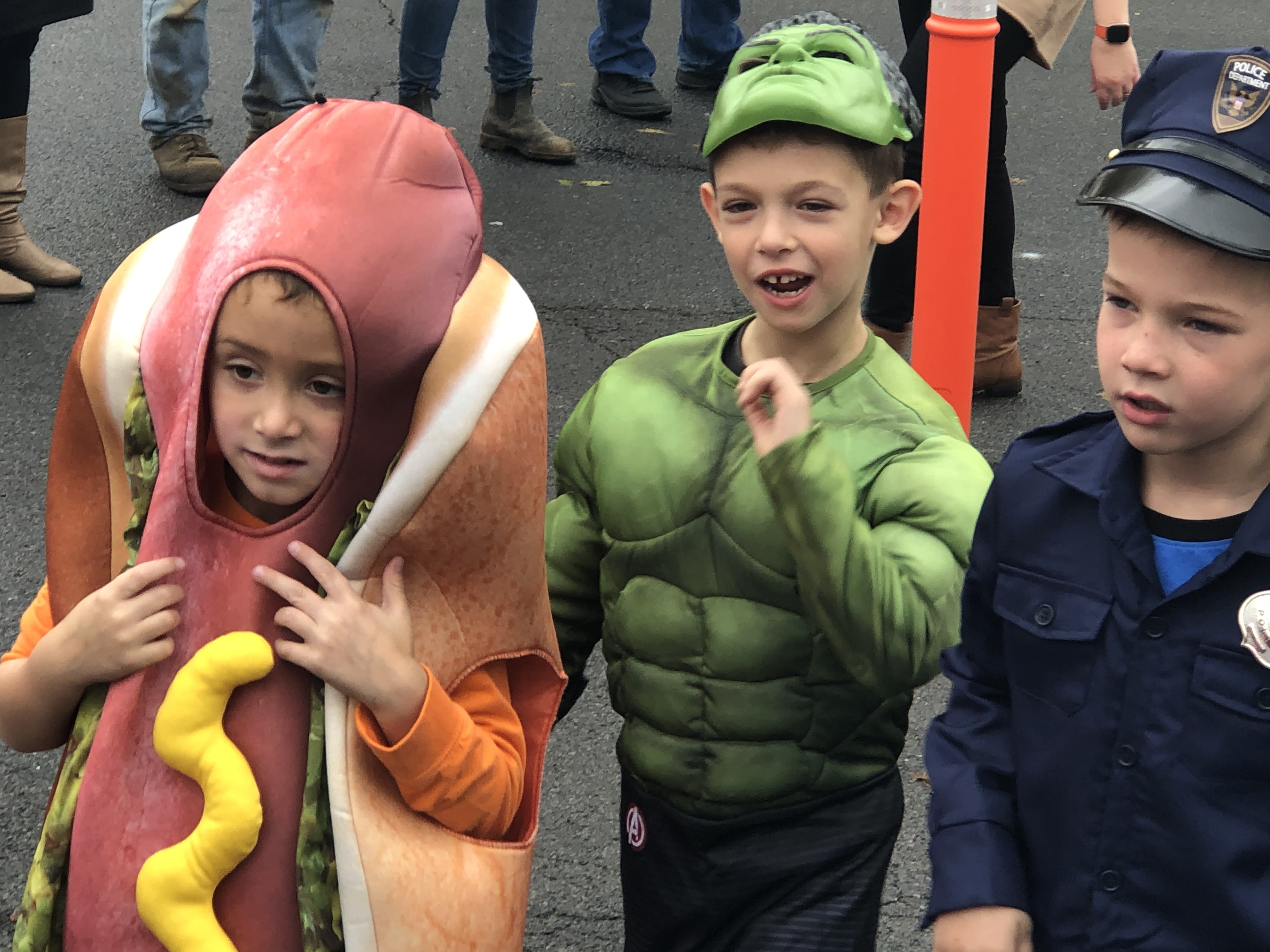 three boys in halloween costumes