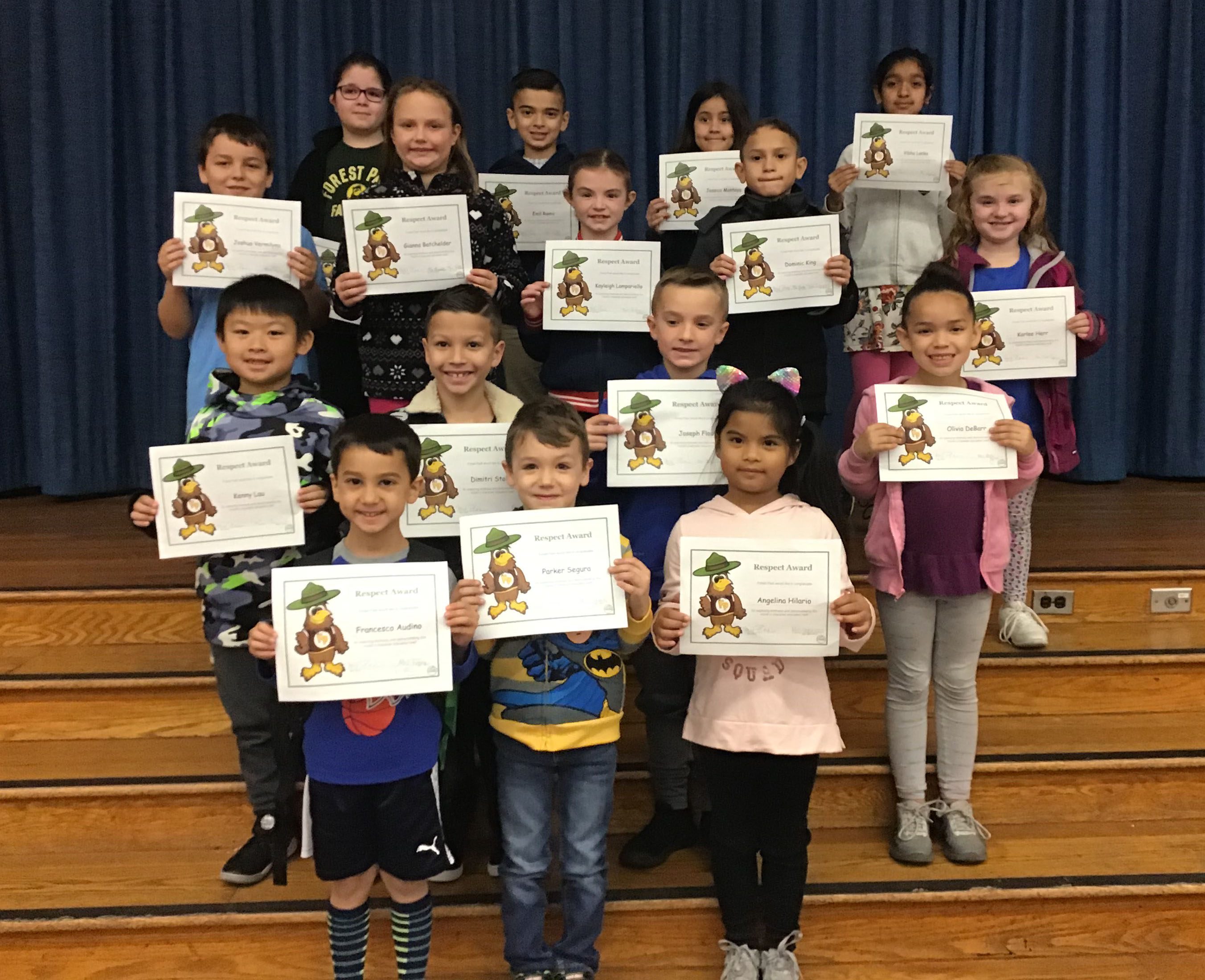 group of students with their award certificates