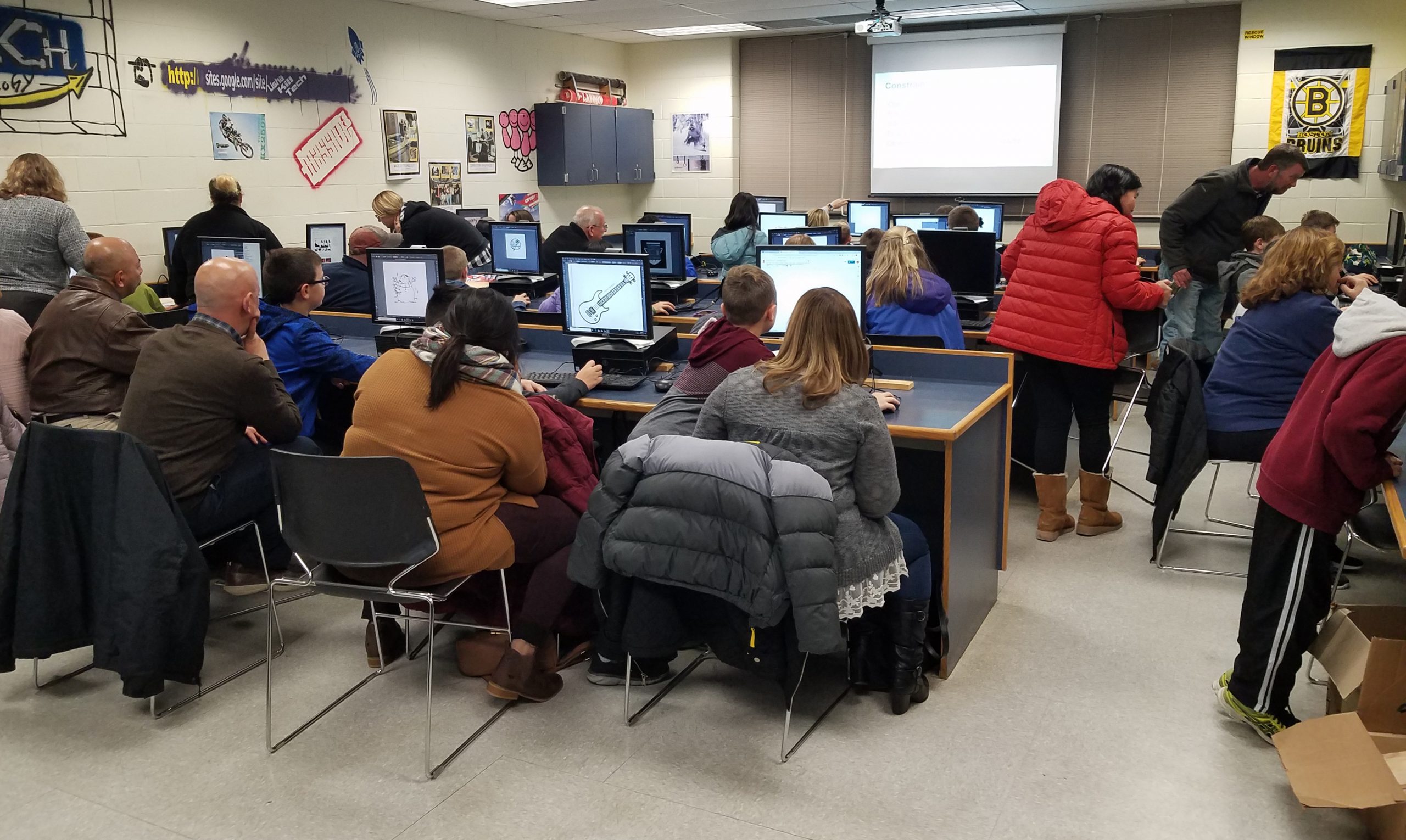 large group works on laser project