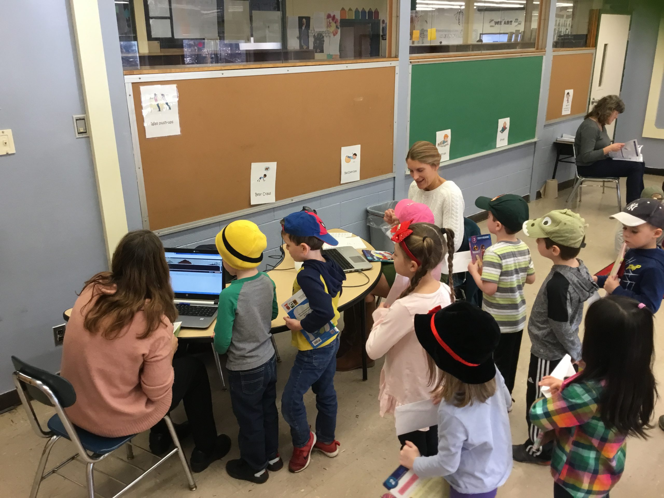 group of students line up to get their library cards