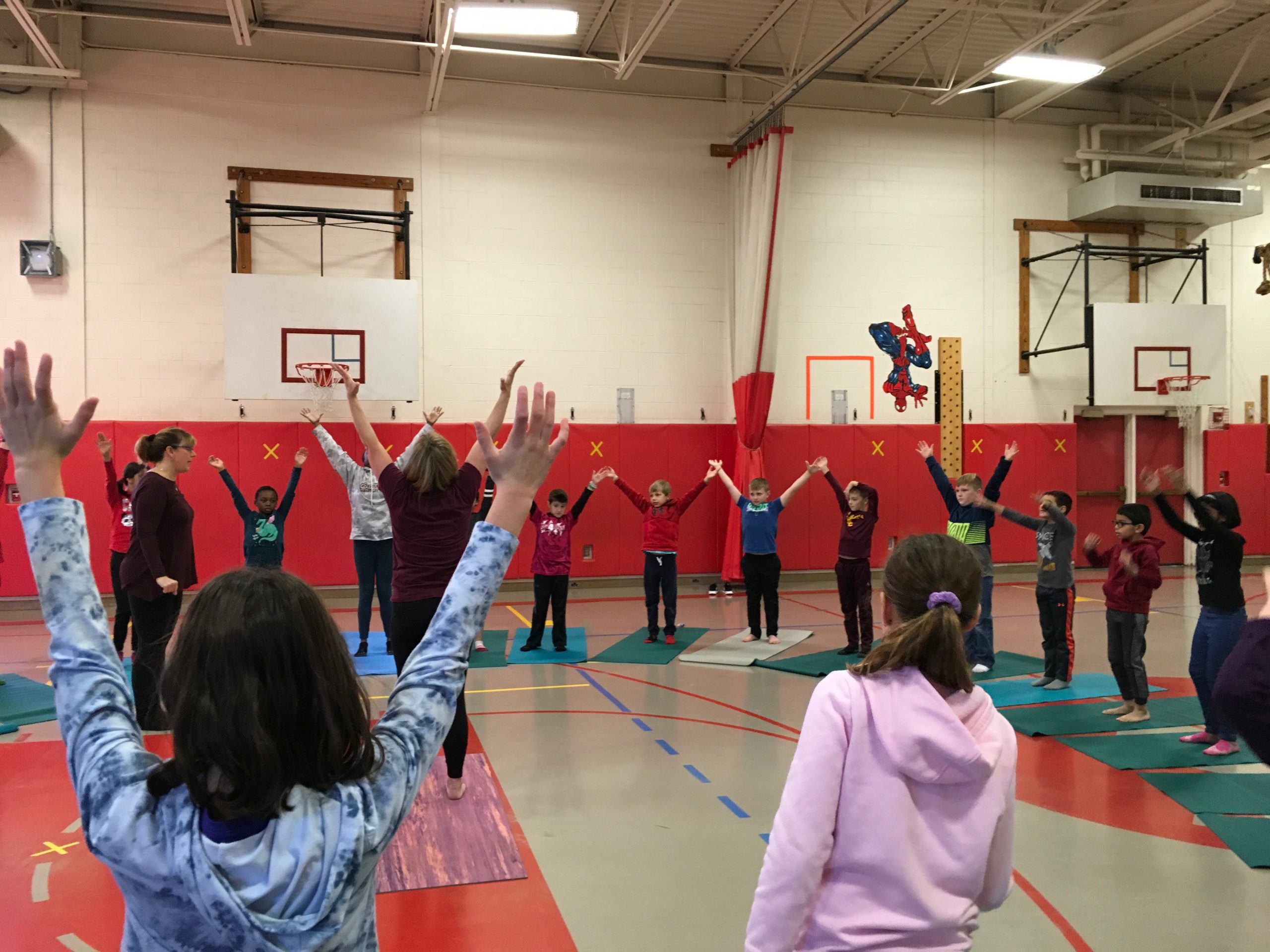 group of students experience yoga