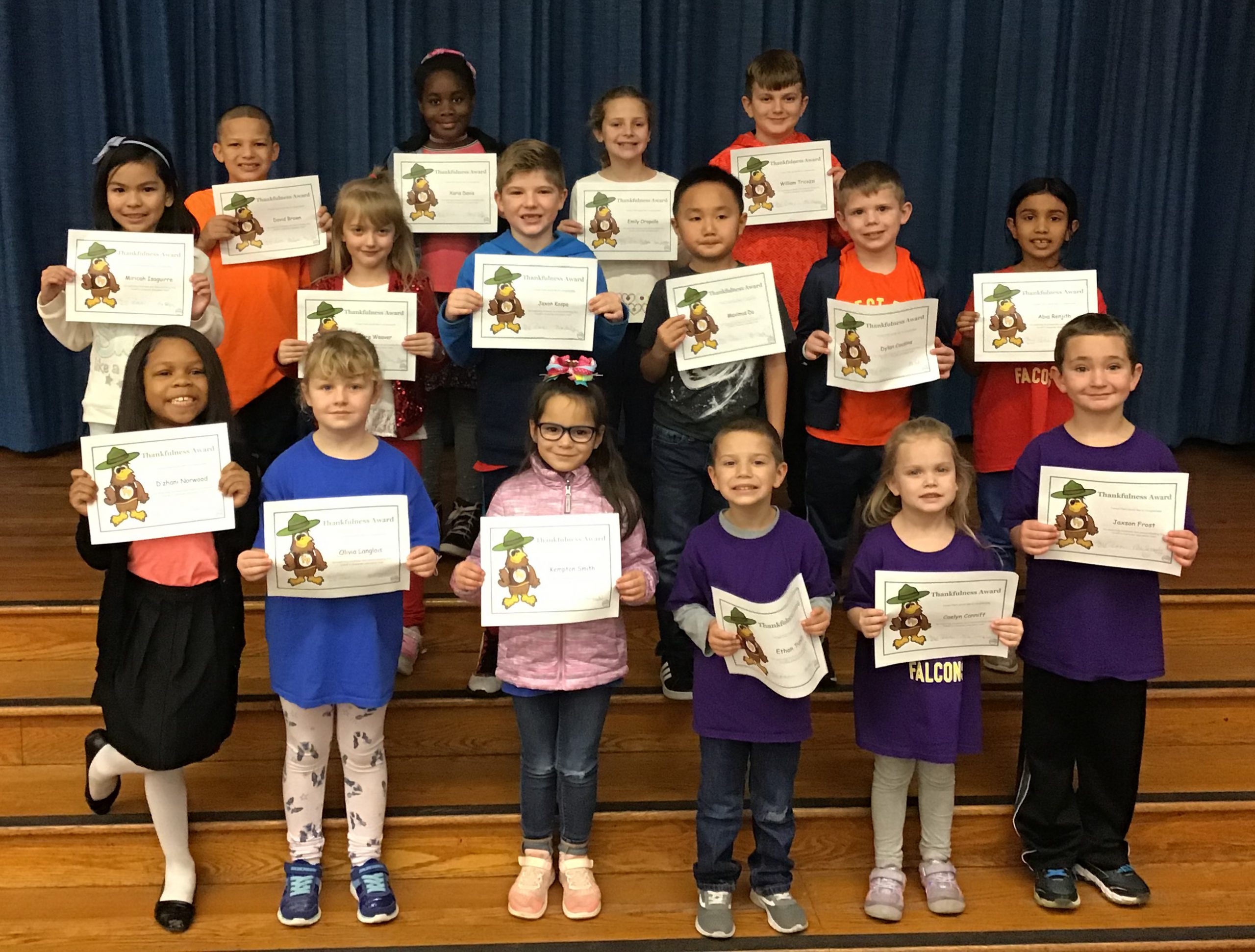 group of students with their award certificates