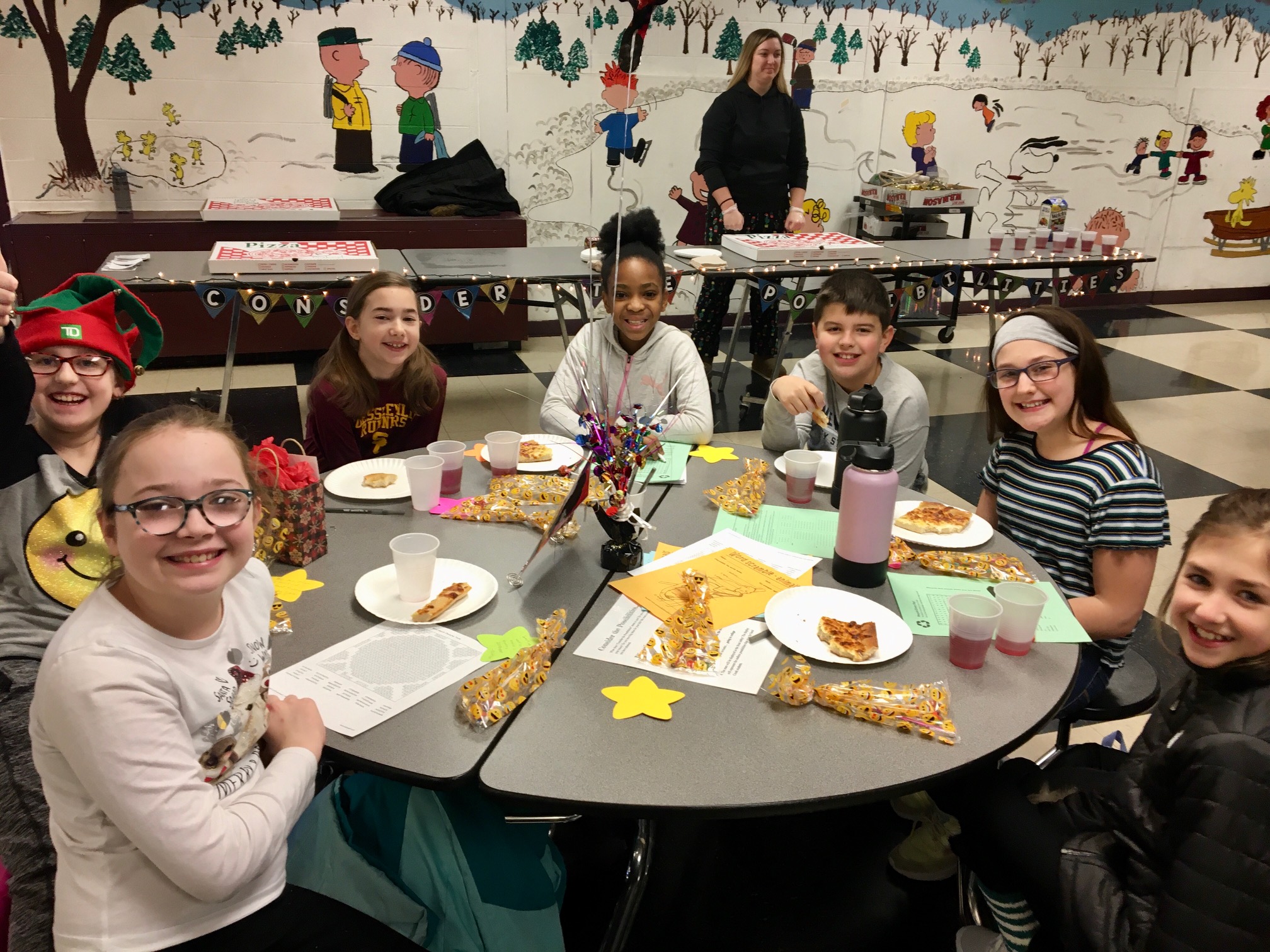 large group of students eating breakfast together