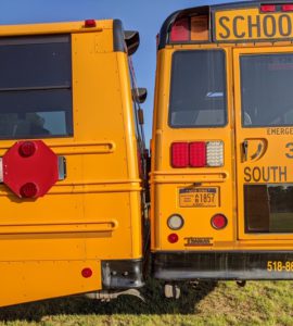 Busses inches away from each other to create message