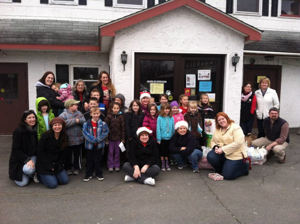 families gather together after volunteering their time in 2012