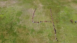 Saddlewood Elementary Class of 2021 aerial group photo. Drone image courtesy of CCHS student Liam Waite.