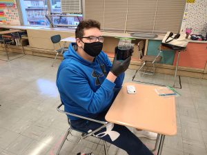 CCHS student participating in a project-based science experiment in Ms. LaMarche's classroom.