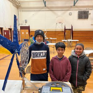 Winning team poses with their turbine