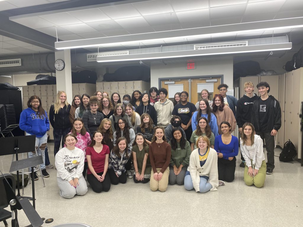 group shot of students with Broadway actress