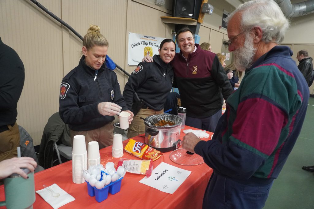 female police officer serves chili