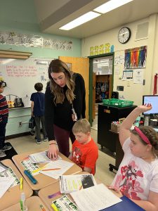 Teacher with her students 